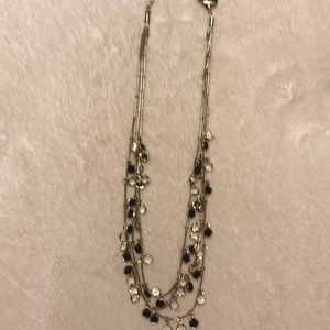 Gold and black necklace